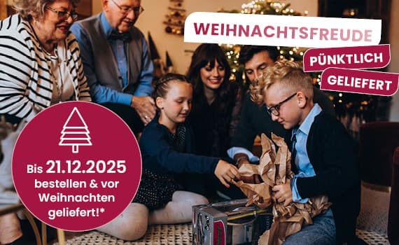 Bis 21.12.2025 bestellen & vor Weihnachten geliefert – Familie sitzt um Weihnachtsbaum, Kinder packen Geschenke aus